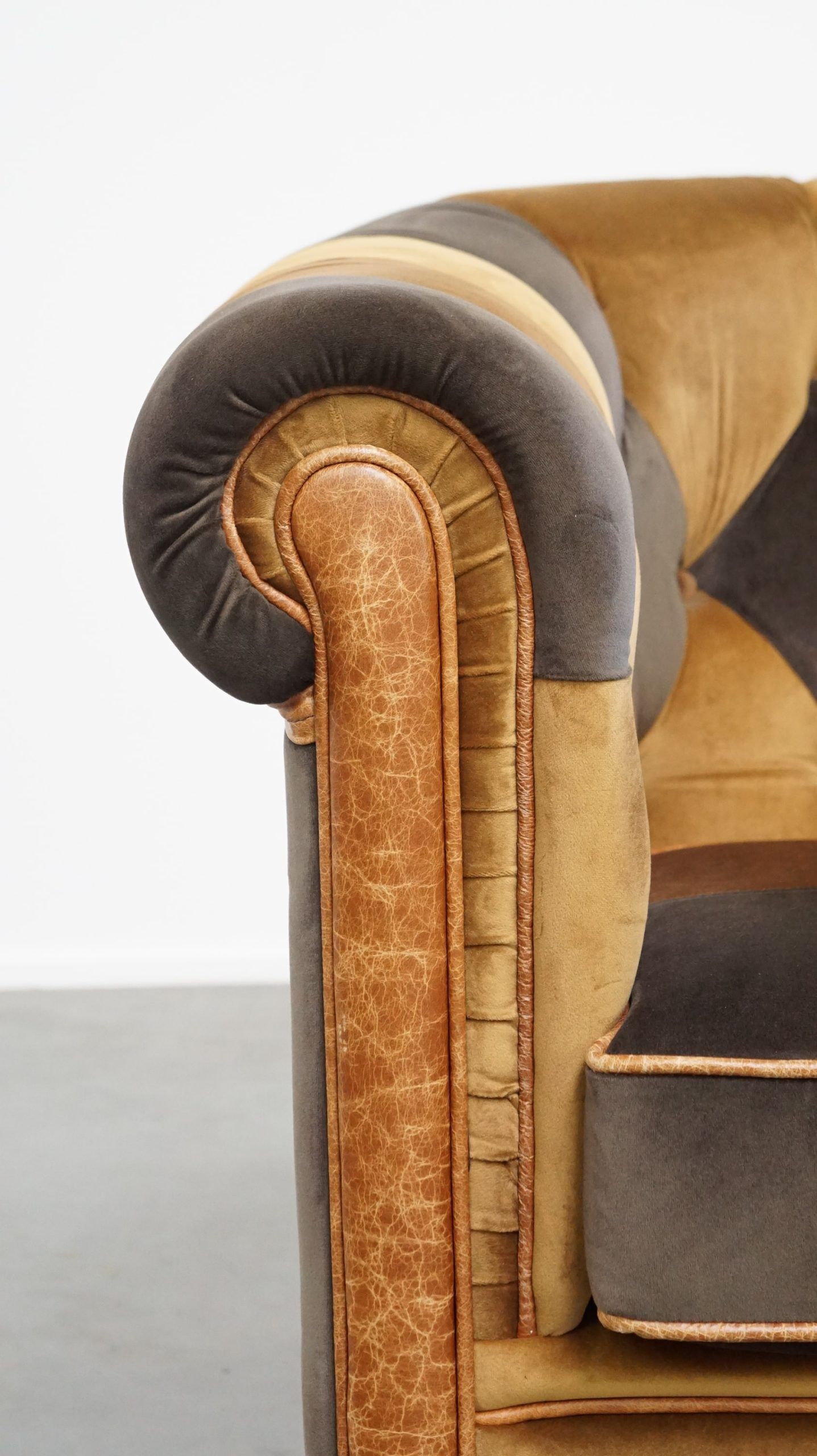 Fauteuil Chesterfield club en tissu patchwork de style anglais