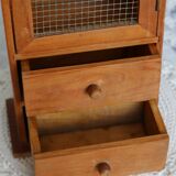 Vintage wooden shelf with drawers and wire mesh door