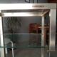 Brass shelf and glass on wheels Pierre Vandel