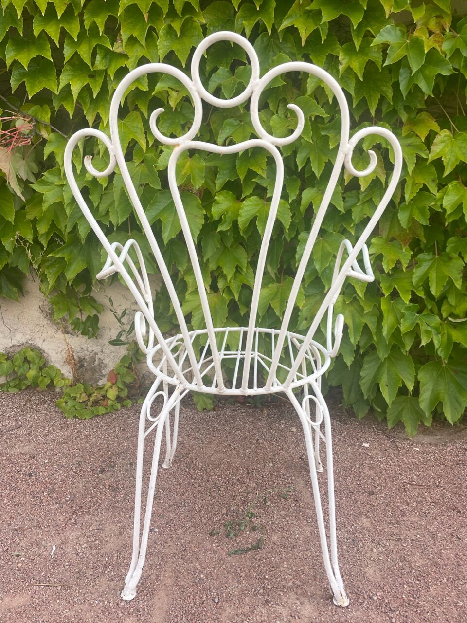 Provençal wrought iron armchairs