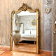 Antique gilded Louis XV pediment mirror