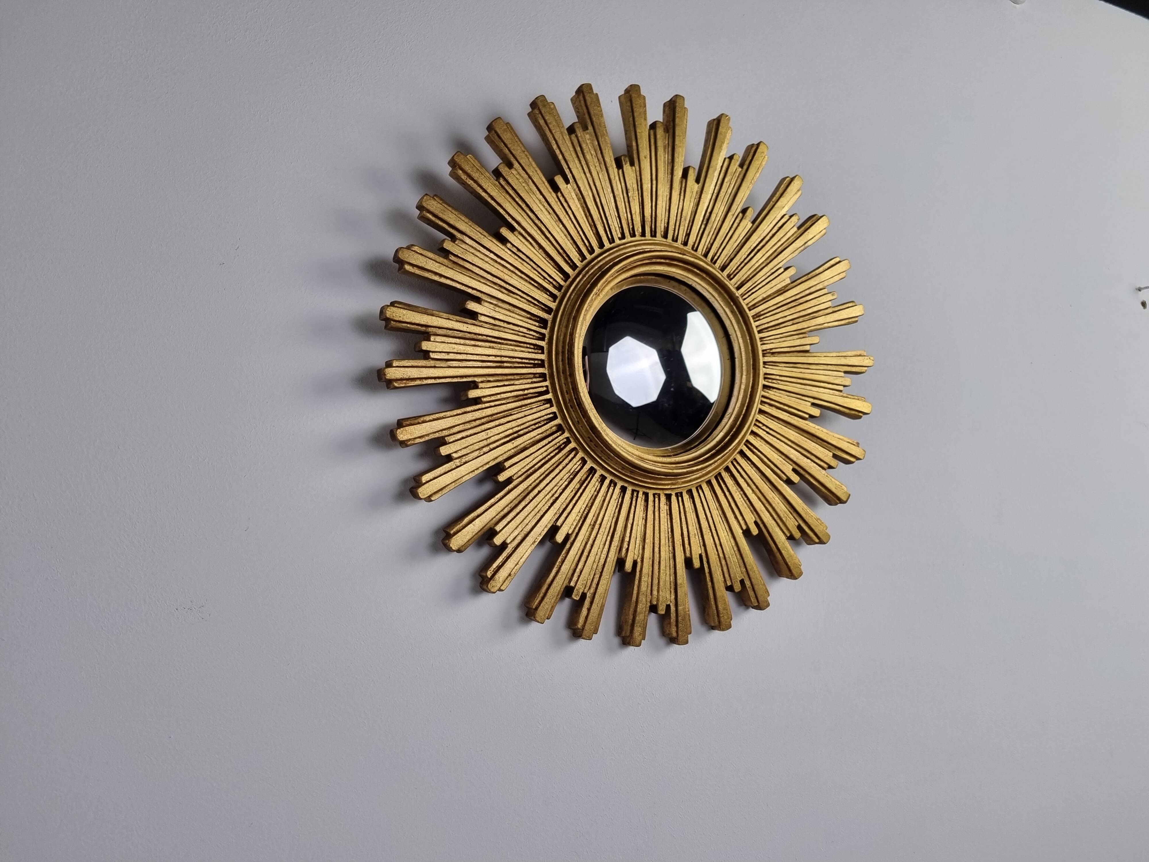 Vintage golden sunburst mirror