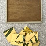Wooden puzzle frame from the 1930s/40s depicting a daffodil.
