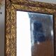 Antique mirror in gilded wood