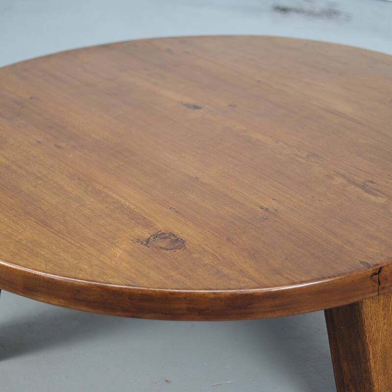 Large vintage round coffee table in raw oak brutalism.