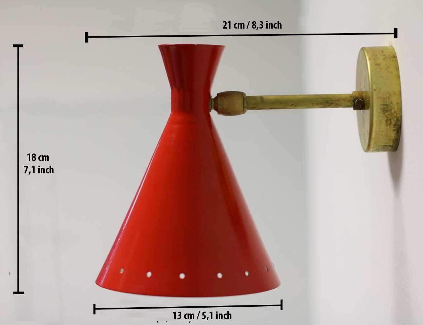 Pair of sconces in the style of creations of the 50s