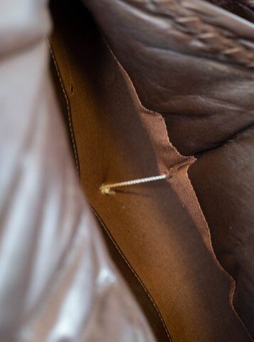 Three seater sofa upholstered with patinated brown leather by Arne Norell, 1970s