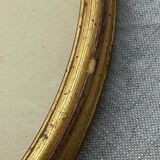 Old oval shaped wooden frame