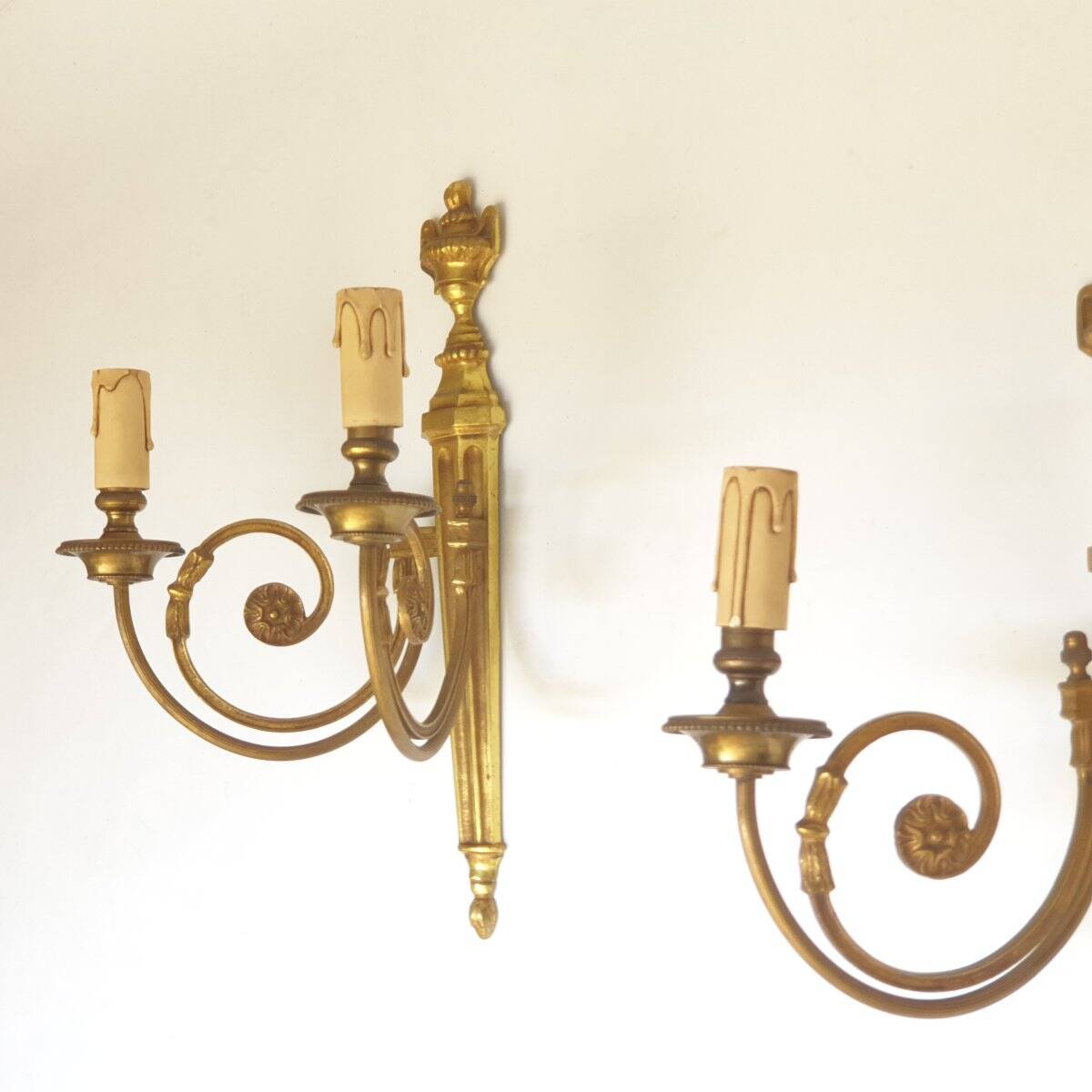 Pair of bronze wall sconces in Louis XVI style
