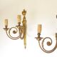 Pair of bronze wall sconces in Louis XVI style