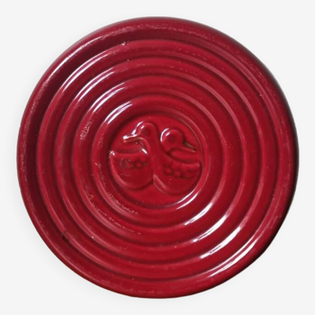 Vintage burgundy red slip ceramic coaster with duck pattern