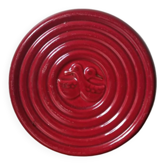 Vintage burgundy red slip ceramic coaster with duck pattern