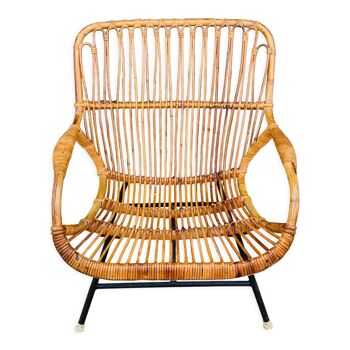 Fauteuil en rotin et piétement en métal noir 1960