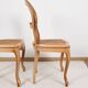 Paire de chaises cannées, en bois