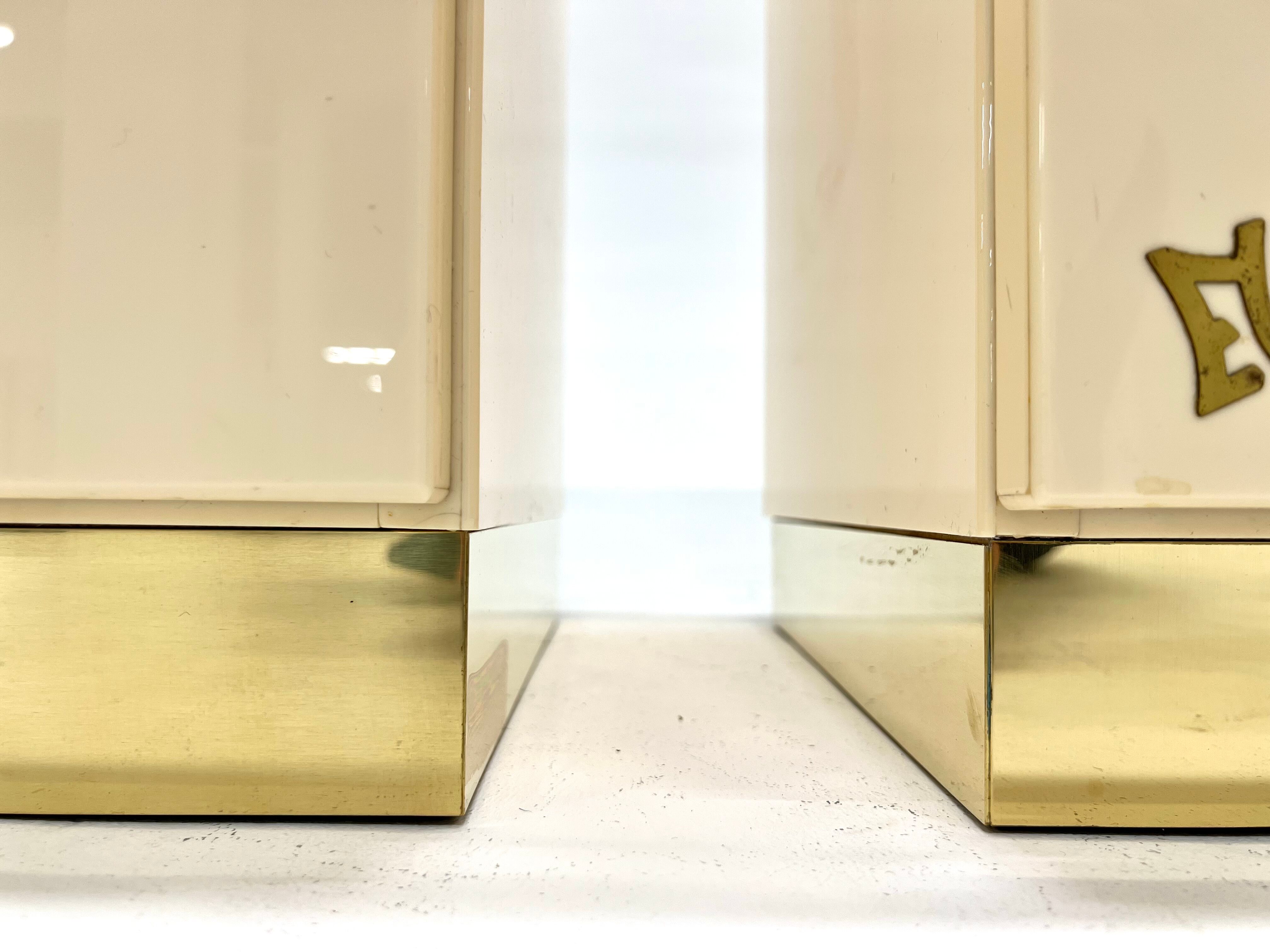 Pair of lacquer and brass bedside tables Éric Maville 1970