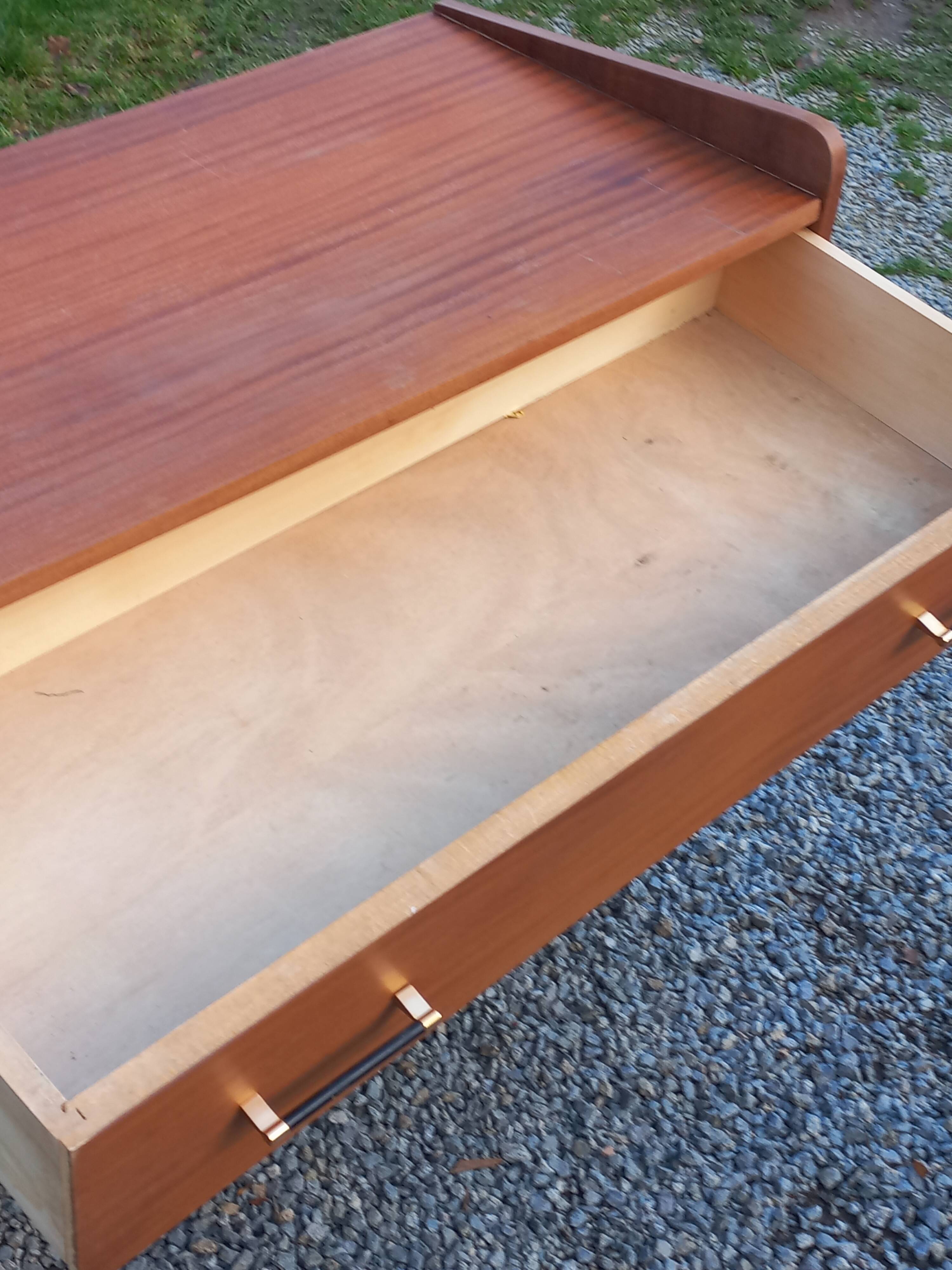 Vintage mahogany commode with metal tapered legs, 4 drawers, 1950s.