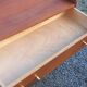 Vintage mahogany commode with metal tapered legs, 4 drawers, 1950s.