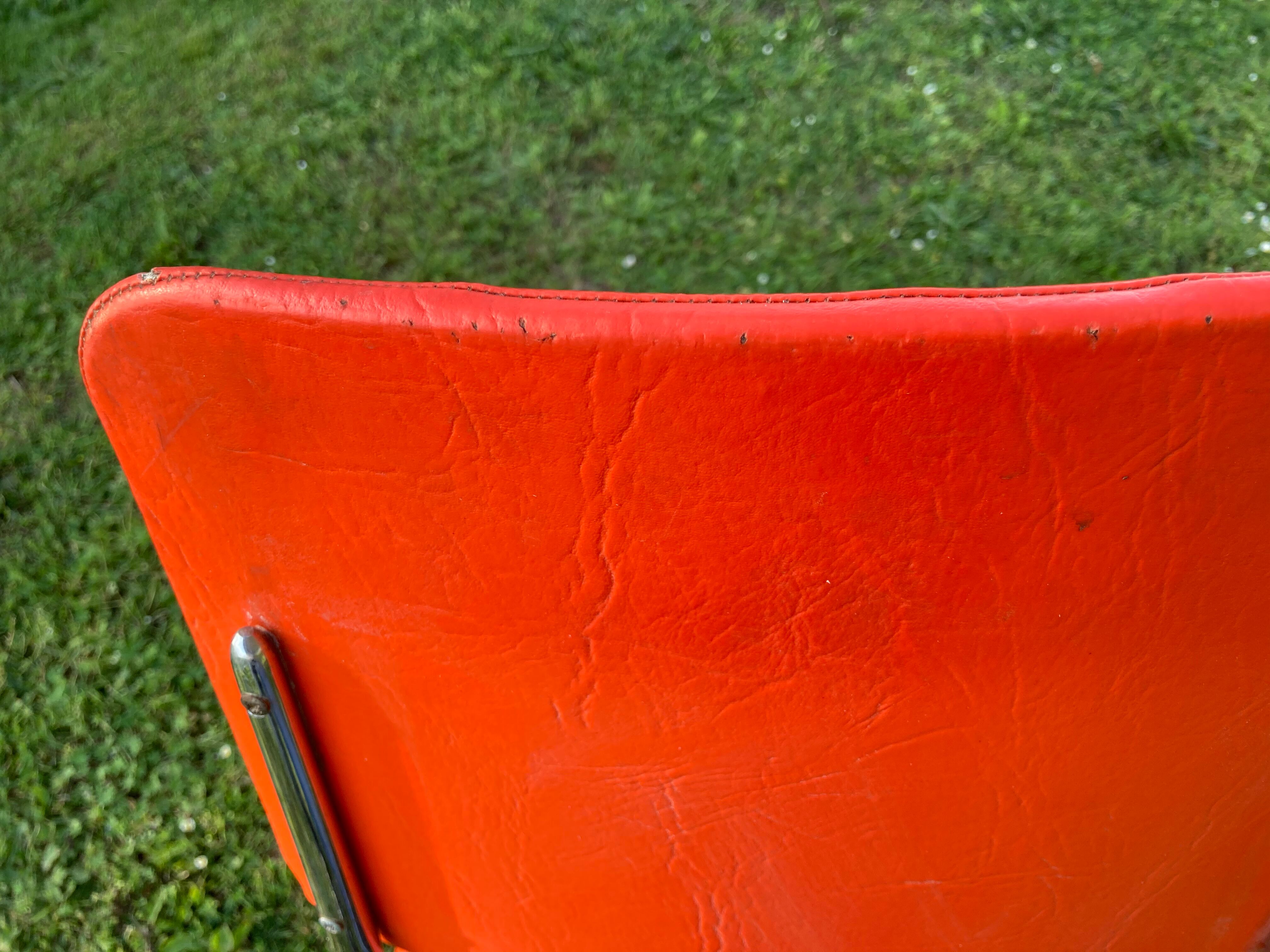 Series of 4 vintage orange chairs