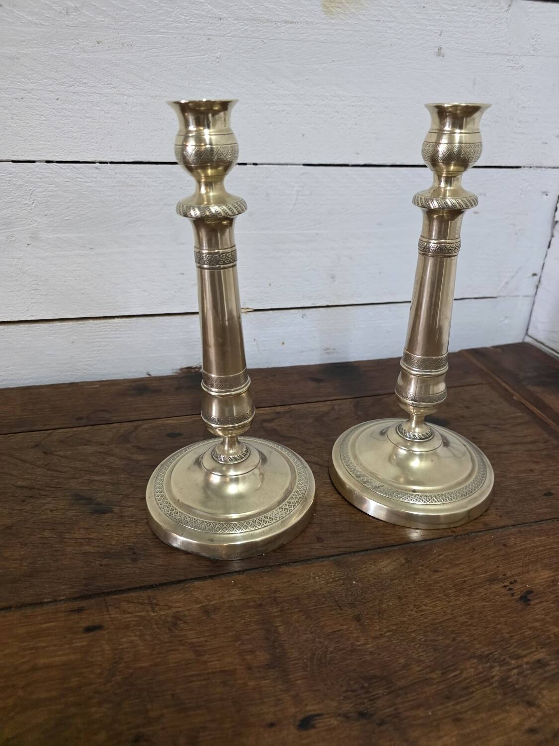 Antique pair of brass candlesticks