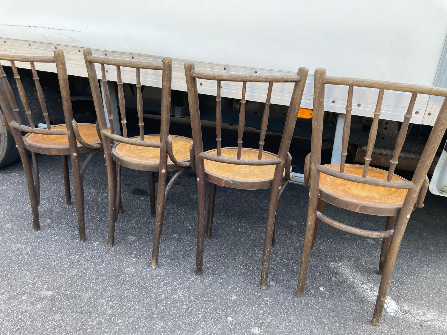 4 curved wooden bistro chairs