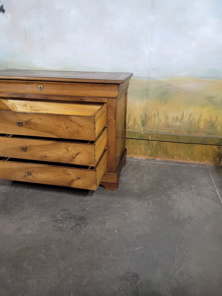 Louis Philippe period chest of drawers in solid walnut.