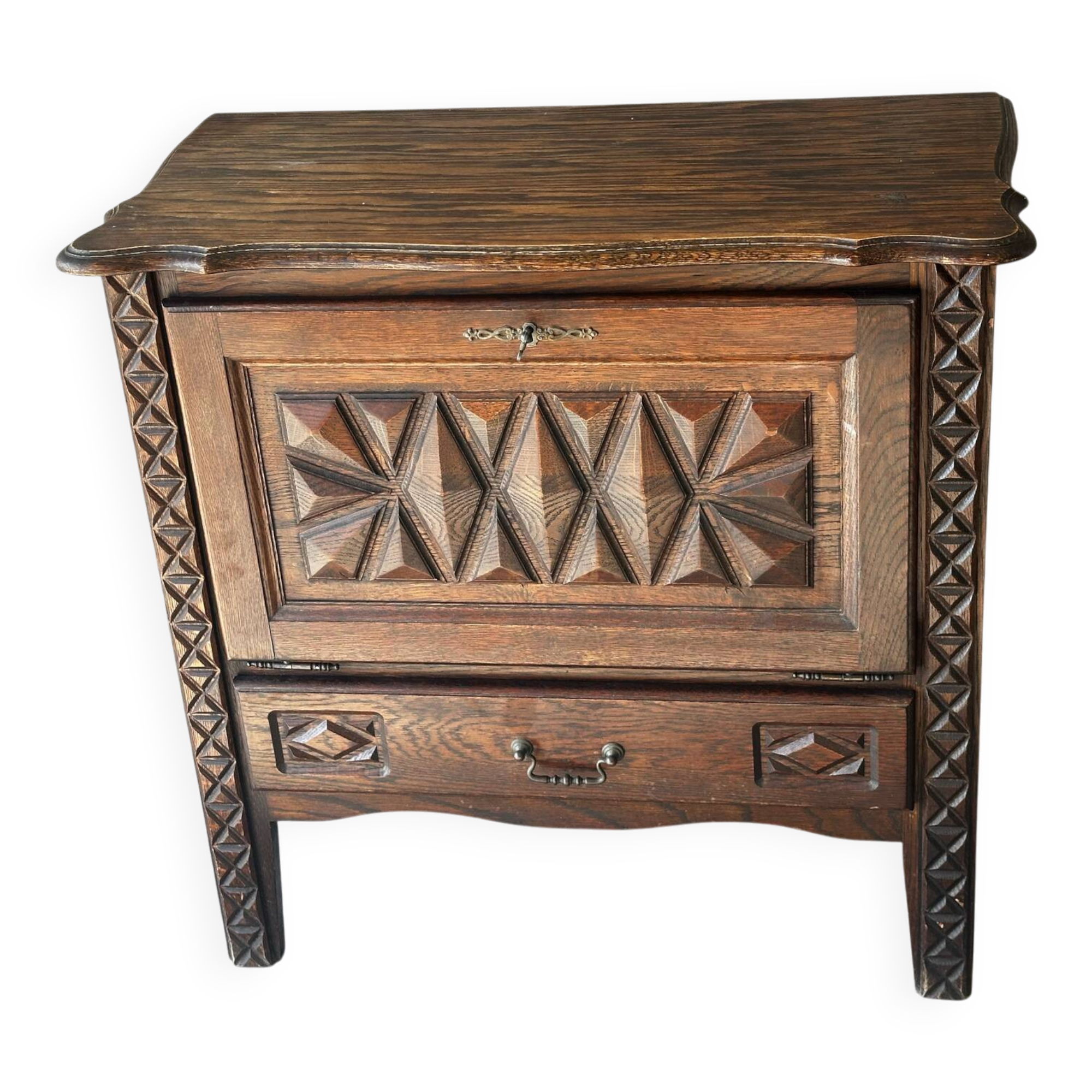 Small storage cabinet in carved oak – circa 1930
