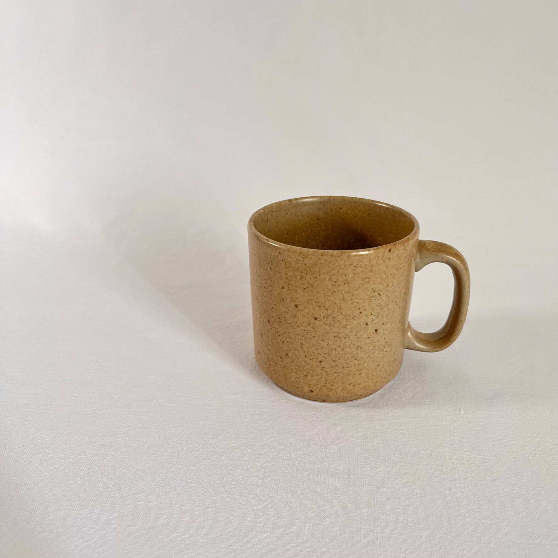 Vintage mug in speckled beige sandstone