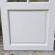 Old wooden door with small squares
