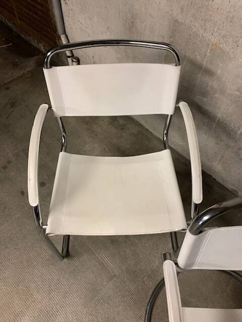 Lot of three vintage tubular armchairs from the 70's