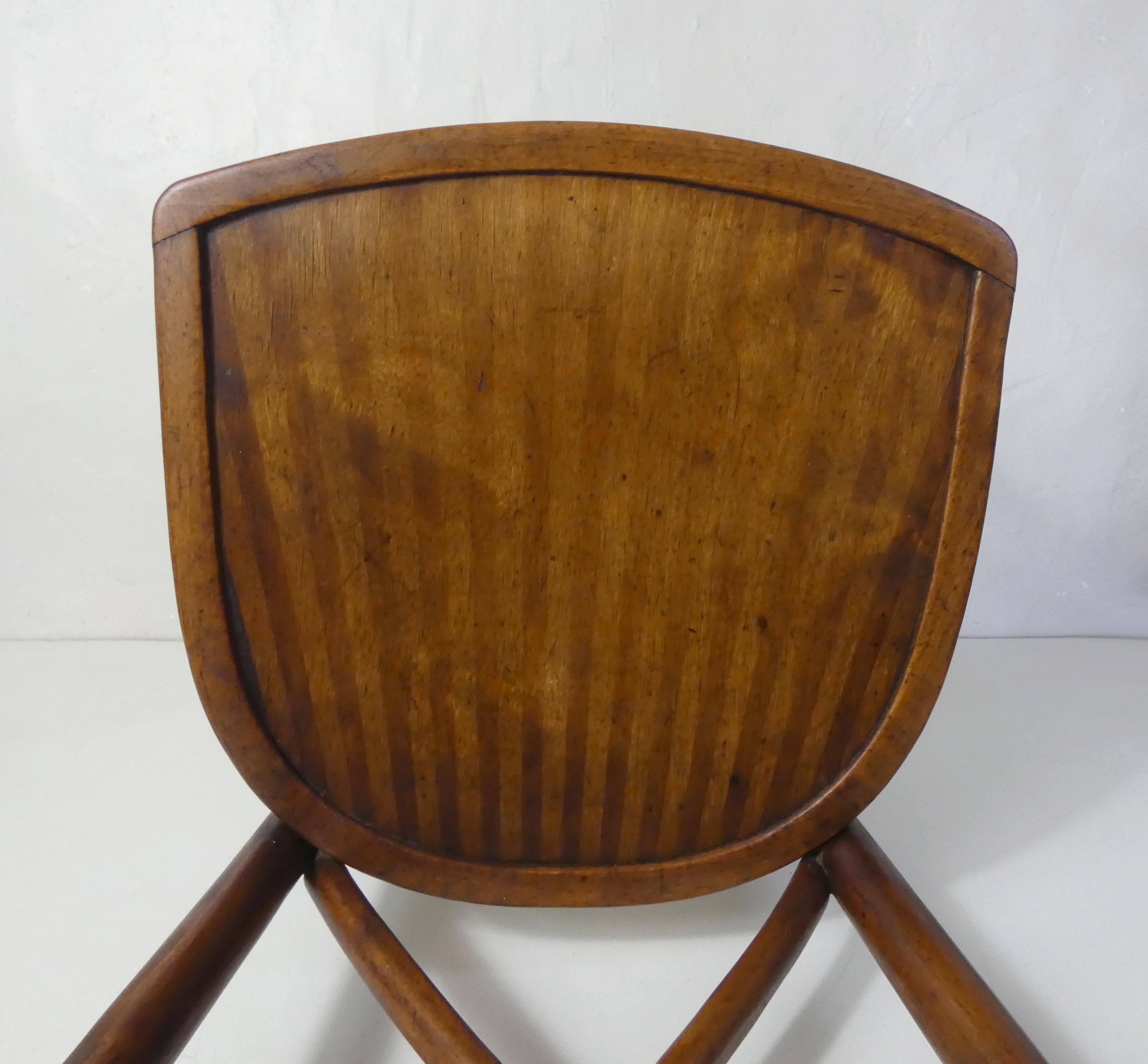 Old curved wooden bistro chair