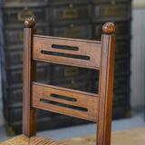 Children's wooden chair with straw seat