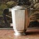 Service à café / thé, art déco en métal argenté et ébène