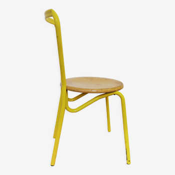 Vintage yellow school chairs from the 90s