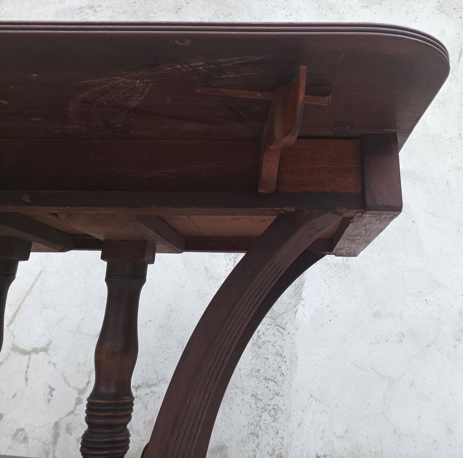 19th-century English style mahogany drop-leaf table.