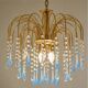 Vintage chandelier with blue Murano glass pendants.