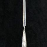 Old necessary to write 1900 in silver metal in box
