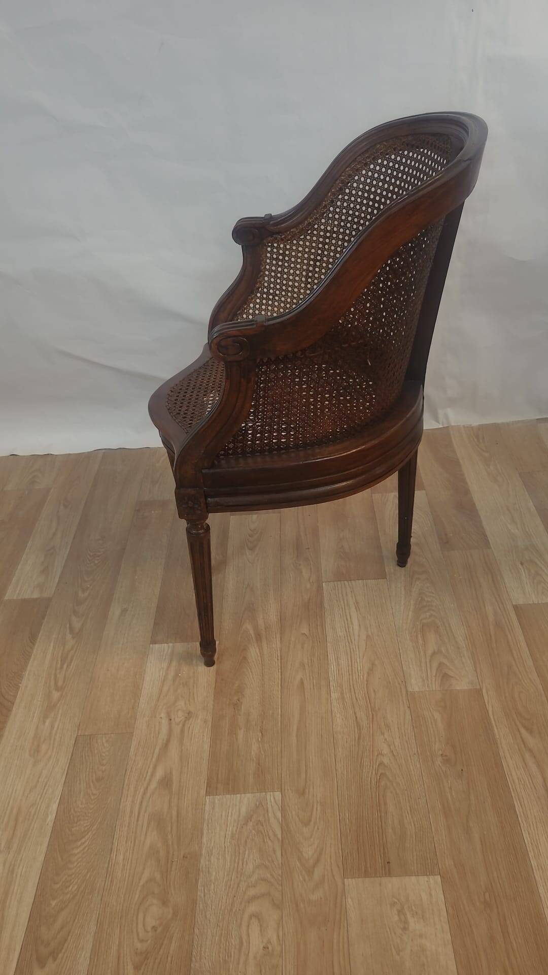 Carved wooden cane armchair – Louis XVI style