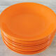 10 Niderviller hollow plates in orange earthenware
