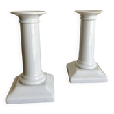 Pair of neo-classical Empire candlesticks from the late 19th century in white porcelain.