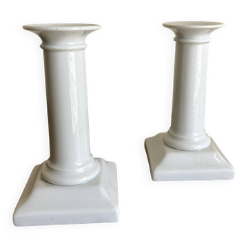 Pair of neo-classical Empire candlesticks from the late 19th century in white porcelain.