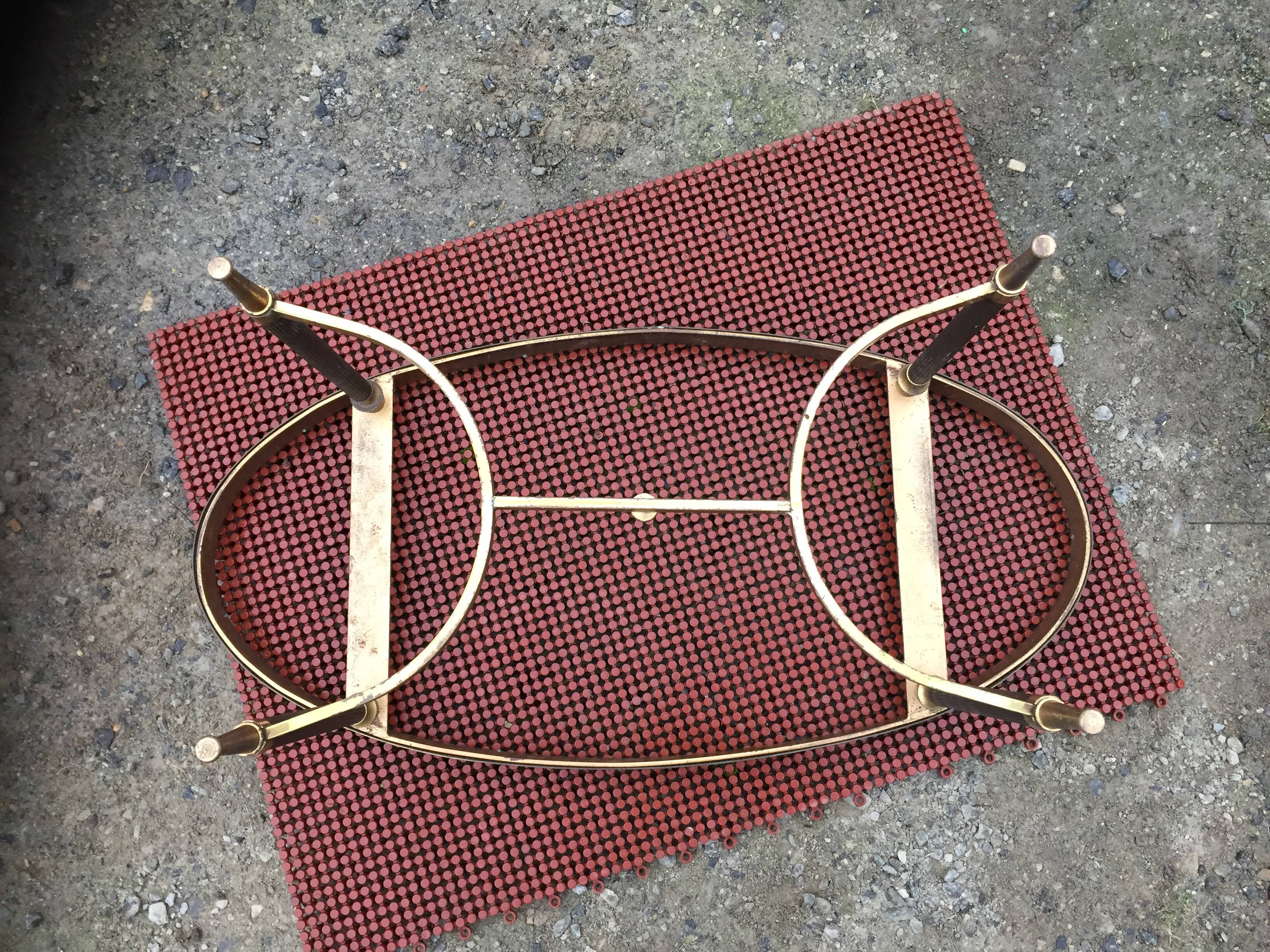 Vintage brass coffee table and oval alabaster top.