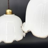 Set of 3 vintage bell-shaped pendants in white opaline with brown trim.