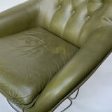 Swivel armchair in olive green leather 1970s