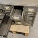 Antique metal workshop furniture has 20 drawers