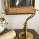 Pair of notary-style lamps in gilded metal