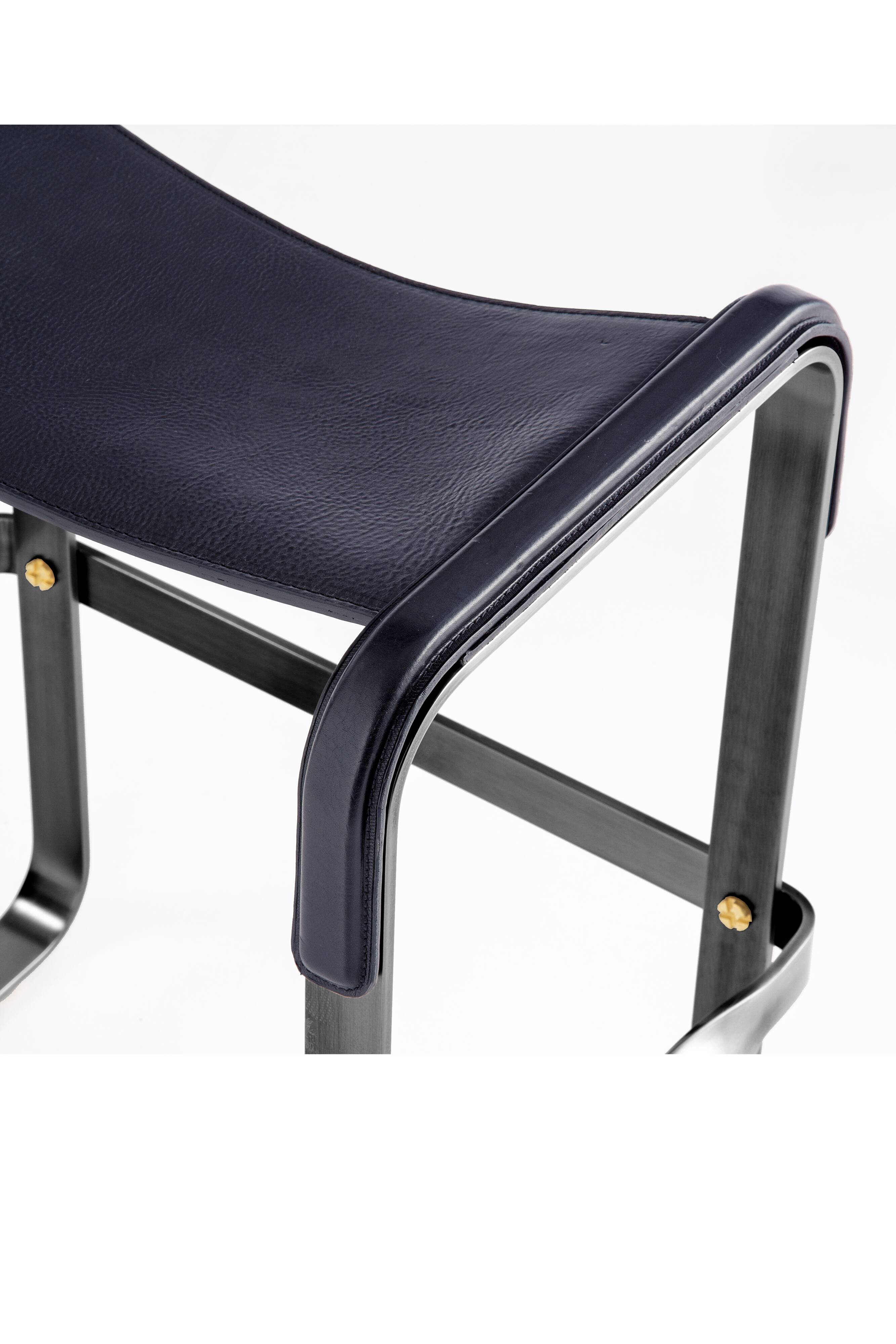 Contemporary classic bar stool in black smoked steel and navy blue leather.