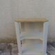 Vintage side table reimagined in beige, wooden tops.