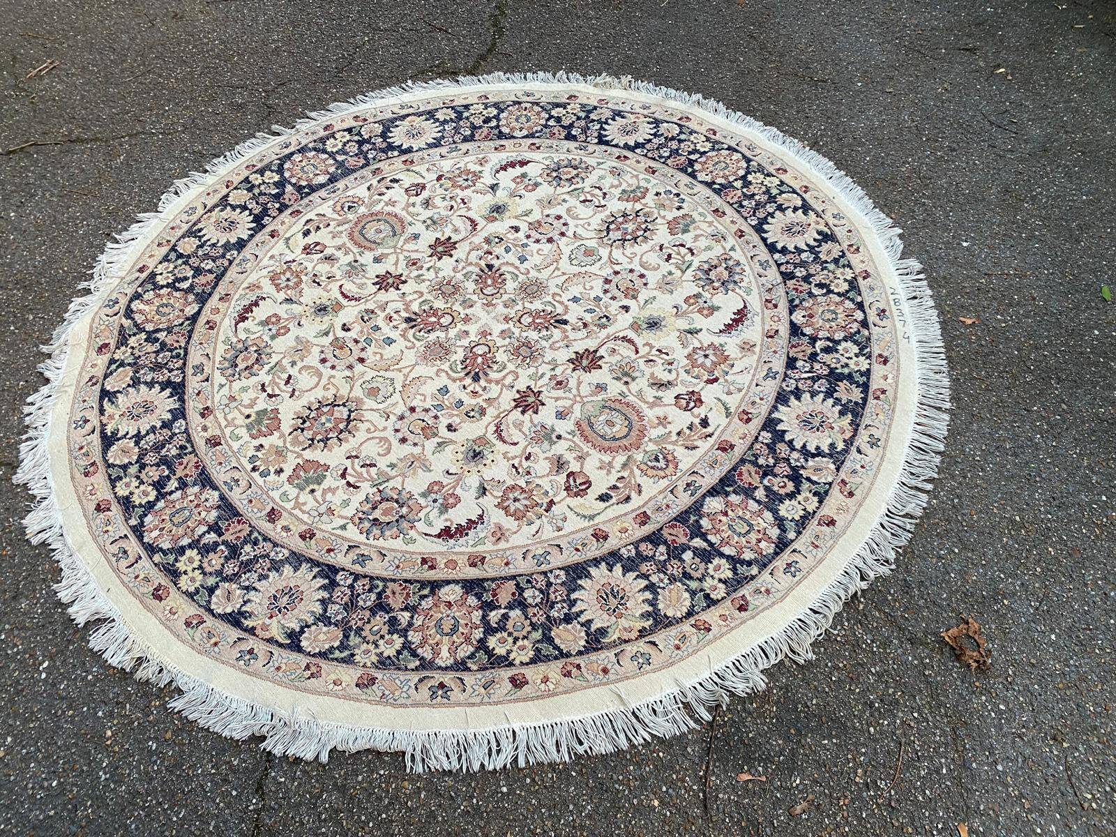 Handmade round wool Persian rug 185cm