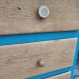 Asymmetrical changing table cabinet