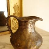 Old solid metal pitcher